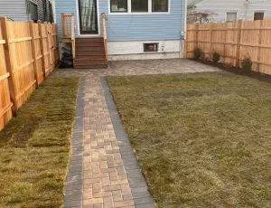 cedar fence and patio paving installation